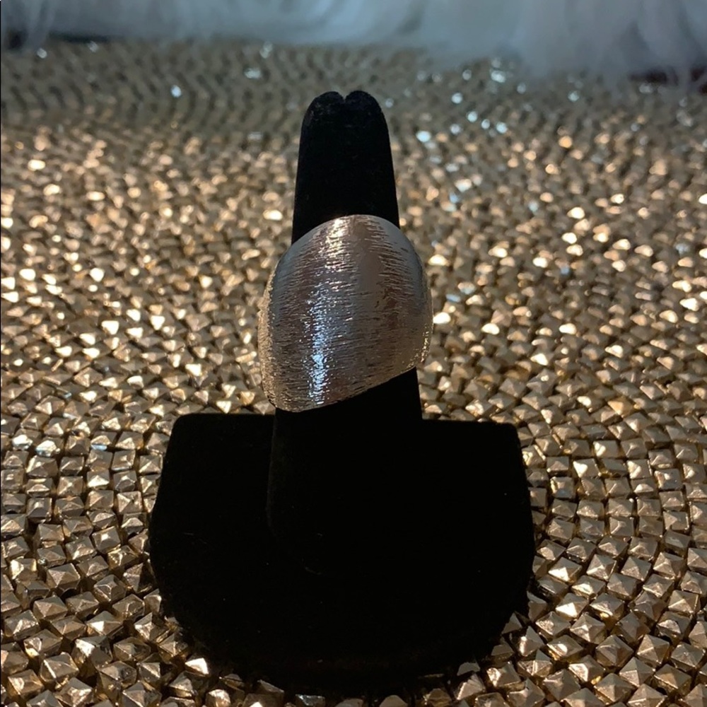 Silver ring with textured surface